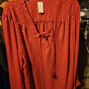 Red blouse silver accents